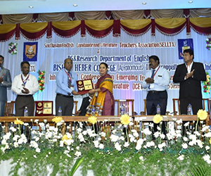 Sujata being felicitated by Dr. Dyabaran, Principal; Bishop Heber College, Trichy