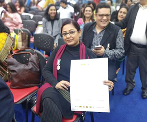 Showing off her Karmaveer Citation and the silver medal